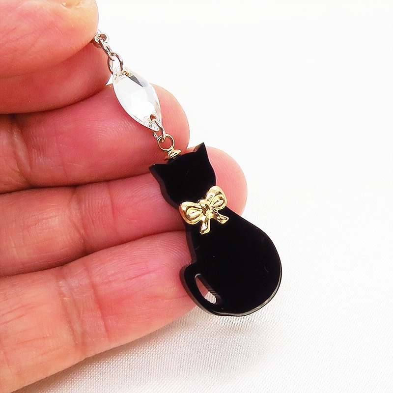 マスクチャーム ゴールドリボンの黒猫チャームとスワロフスキーのチャーム アクリル キーホルダー