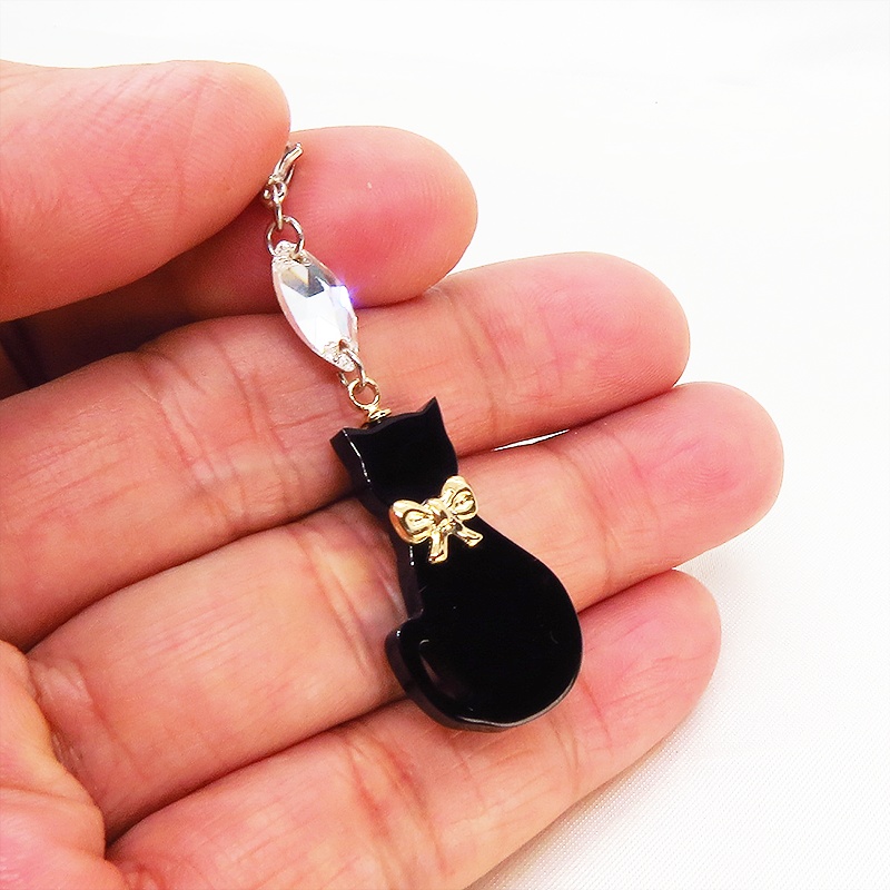マスクチャーム ゴールドリボンの黒猫チャームとスワロフスキーのチャーム アクリル キーホルダー