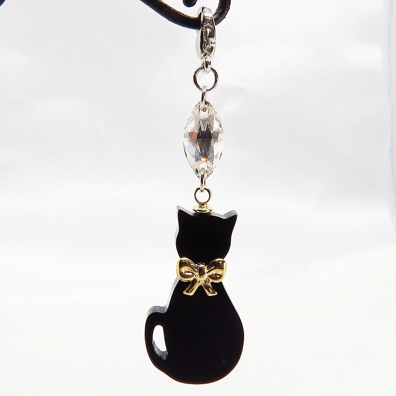 マスクチャーム ゴールドリボンの黒猫チャームとスワロフスキーのチャーム アクリル キーホルダー
