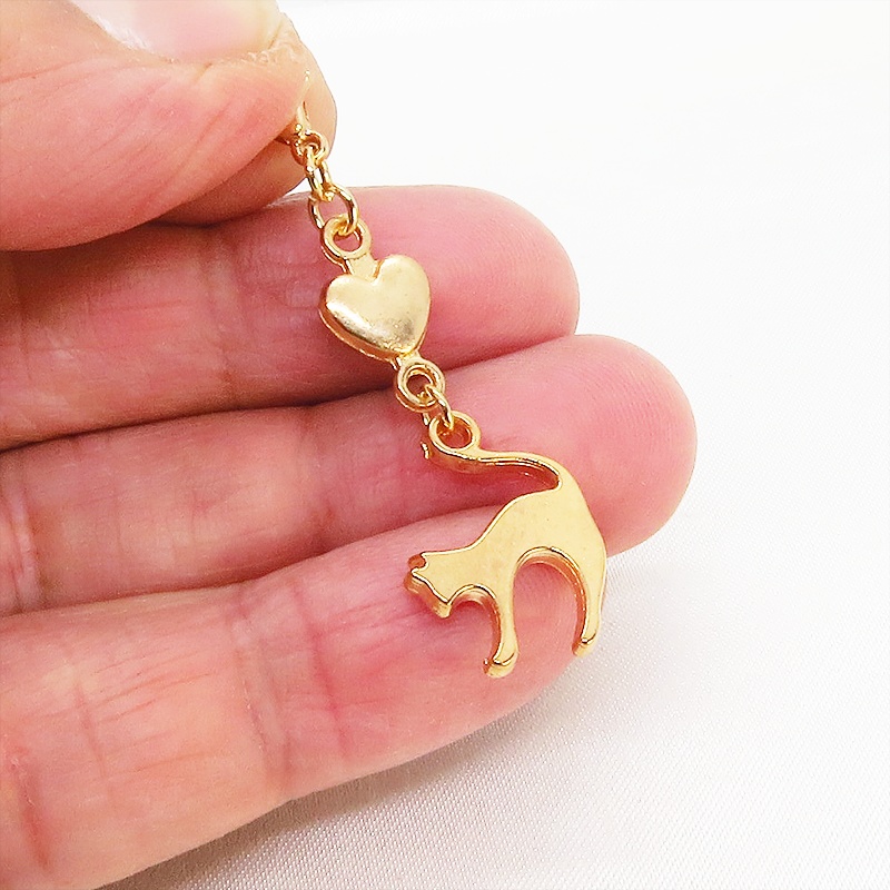 マスクチャーム マットゴールドの跳ね猫とハートの大人可愛いチャーム キーホルダー