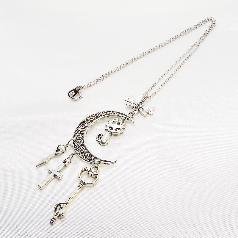 アンティークシルバー 猫とアラベスク調の透かし模様の入った三日月のネックレス リボン 鍵 ロザリオ 時計の針 長さ調整可