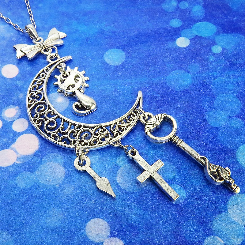 アンティークシルバー 猫とアラベスク調の透かし模様の入った三日月のネックレス リボン 鍵 ロザリオ 時計の針 長さ調整可