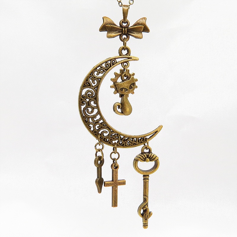 アンティークゴールド 猫とアラベスク調の透かし模様の入った三日月のネックレス リボン 鍵 ロザリオ 時計の針 長さ調整可