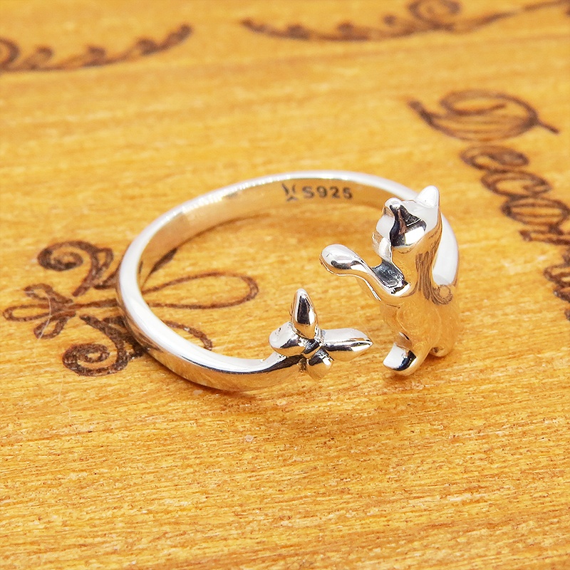 【再々販】【再販×3】シルバー925 蝶とたわむれる子猫のシルエットをかたどったオープンリング