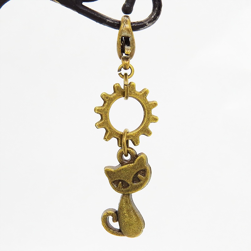 マスクチャーム アンティークカラー 猫と中があいた歯車を組み合わせた可愛いチャーム キーホルダー スチームパンク風