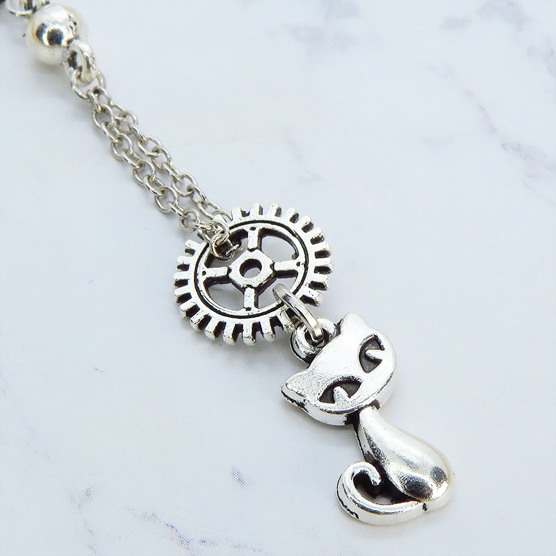スチームパンク風 アンティークシルバーの猫と歯車のチェーンピアス