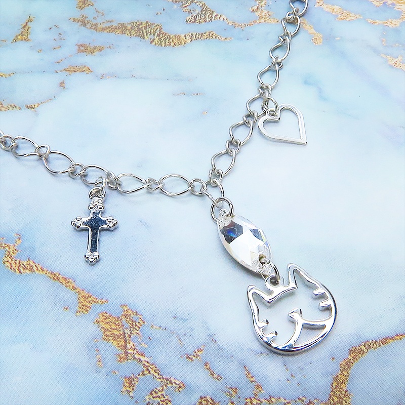 猫フェイスシルエットモチーフと大きめスワロフスキー(クリアカラー)のブレスレット シルバーカラー ロザリオ ハート