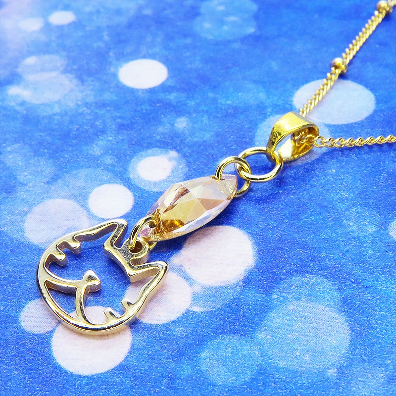 猫フェイスシルエットモチーフとと大きめスワロフスキー・クリスタル(クリアカラー)のネックレス ゴールドカラー