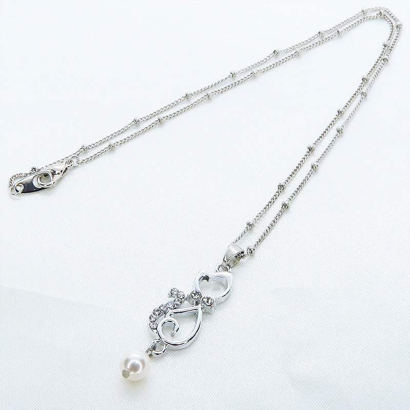 優しい曲線を描く猫シルエットモチーフのペンダントネックレス シルバーカラー ラインストーン デコ玉付チェーン