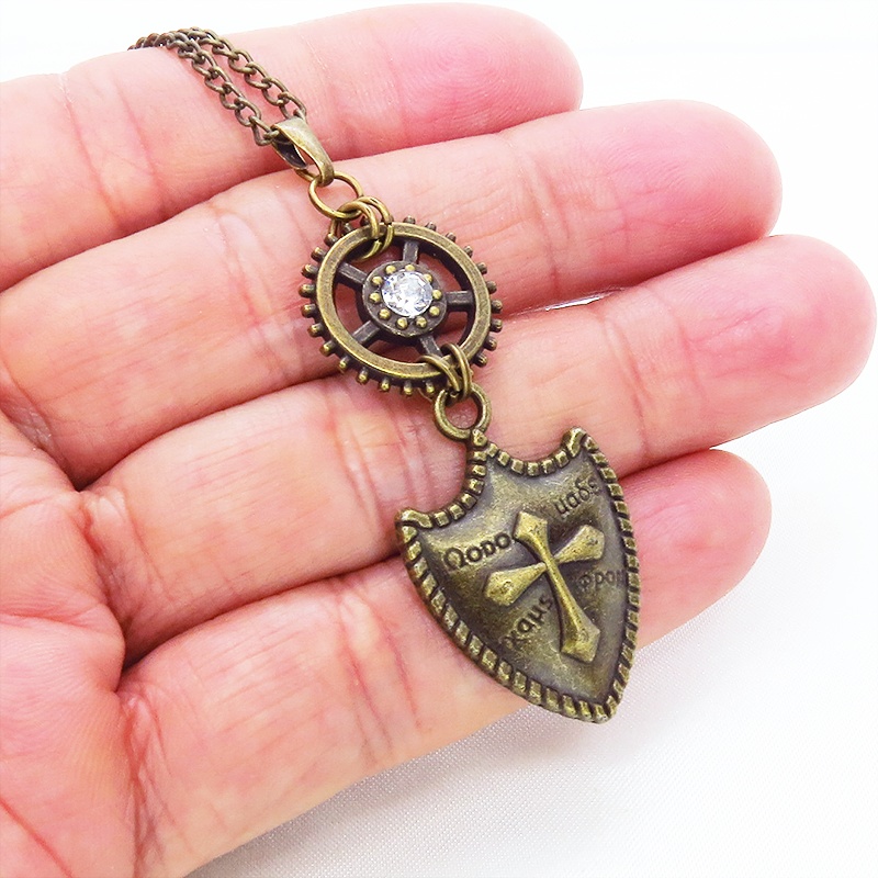 アンティークゴールド 盾(シールド)と歯車のゴシックネックレス スチームパンク風 スワロフスキー エンブレム 長さ調整可