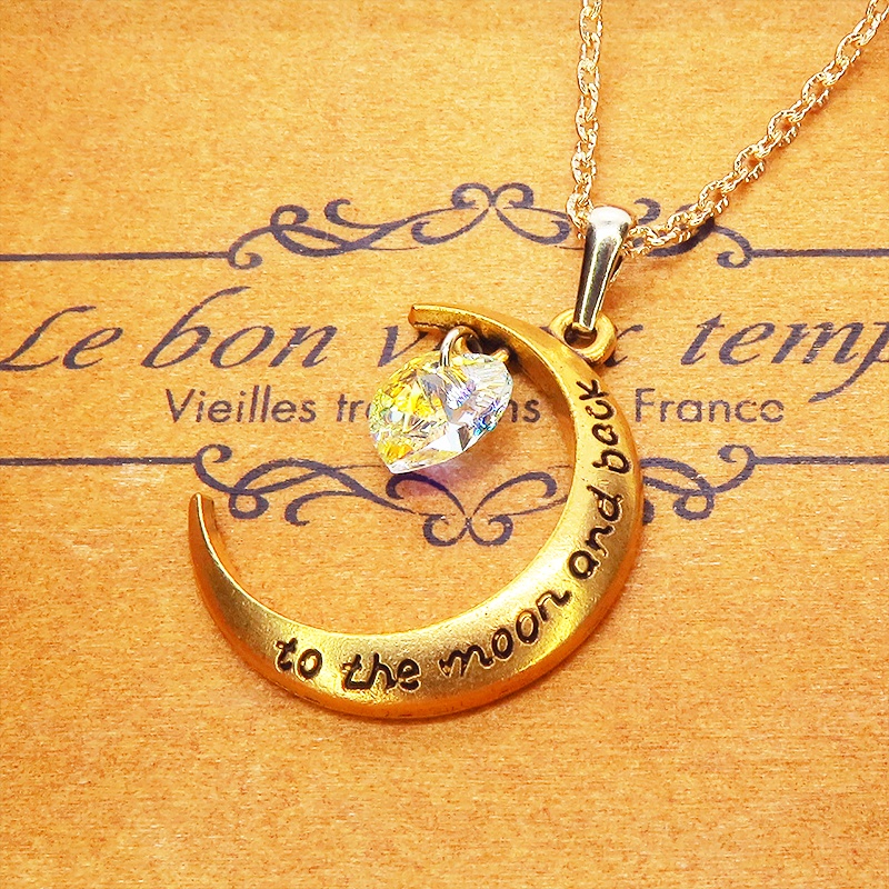 マットゴールド 三日月とハート型スワロフスキー・クリスタルを組み合わせたネックレス クリスタルオーロラ 長さ調整可
