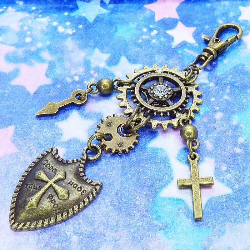アンティークゴールド 歯車と盾(シールド)モチーフの組み合わせたスチームパンクキーホルダー バッグチャーム 金具変更可