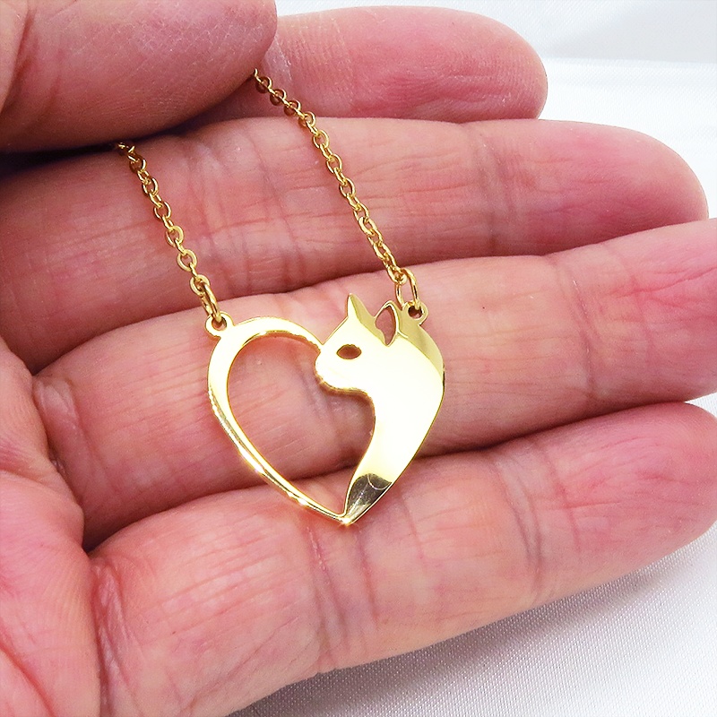 ステンレス製ゴールドカラーの猫とハートを組合せた可愛いモチーフのネックレス オープンハートネックレス