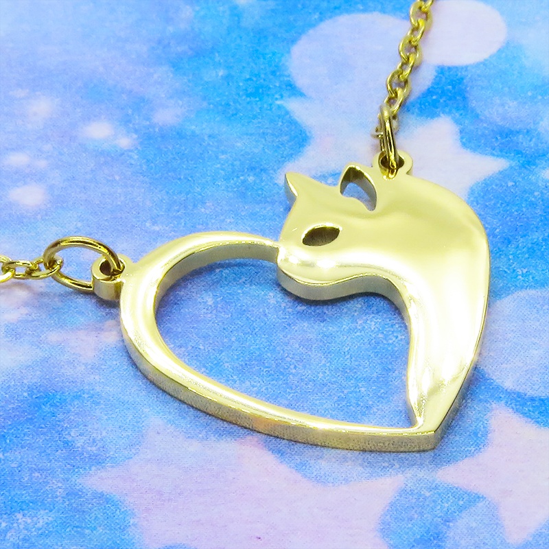 ステンレス製ゴールドカラーの猫とハートを組合せた可愛いモチーフのネックレス オープンハートネックレス