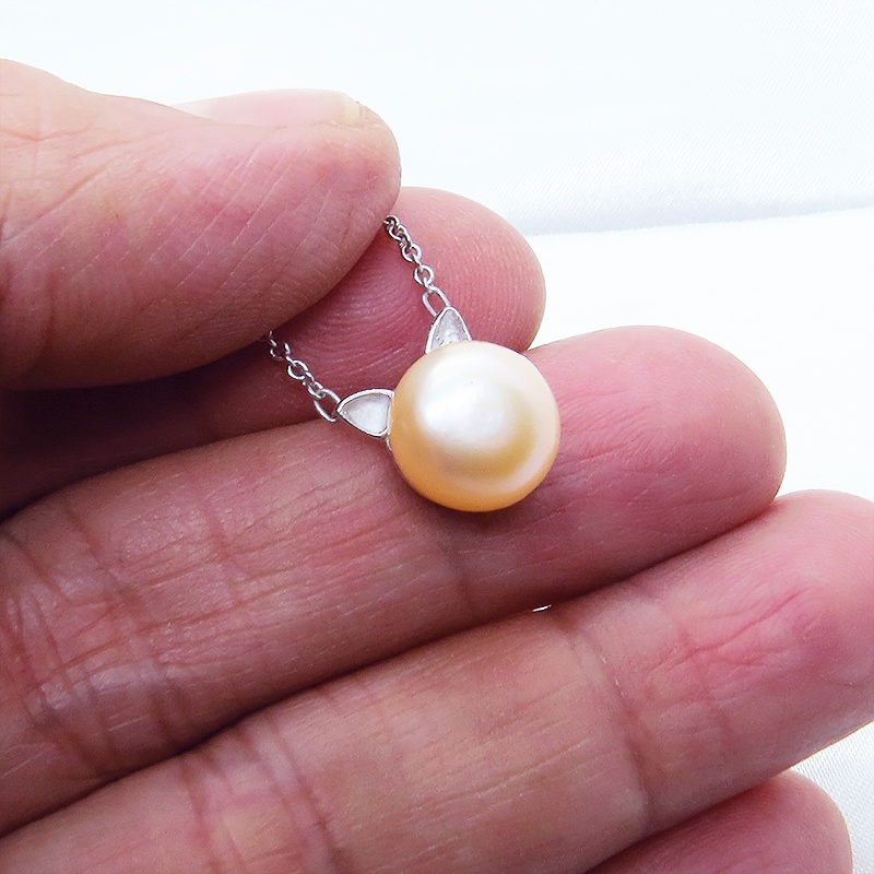 シルバー925 淡水パール(コーラルピンク) シンプルにさり気なく大人可愛い猫耳パールのネックレス ワンポイント