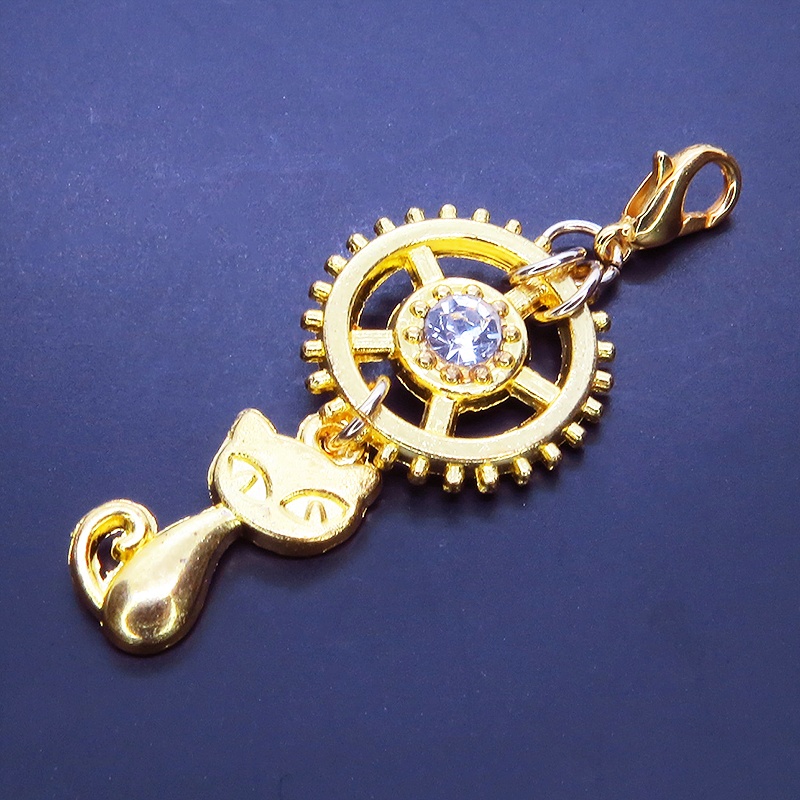 マスクチャーム 猫と大きめ歯車のチャーム ゴールドカラー スワロフスキー(クリアカラー) キーホルダー ペンダント