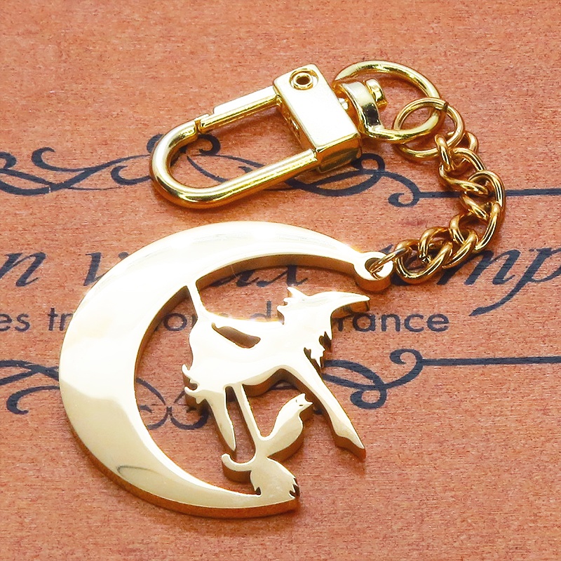 ステンレス製 ホウキにまたがる魔女と猫と三日月のキーホルダー ゴールドカラー バッグチャーム 魔法使い 猫 シルエット