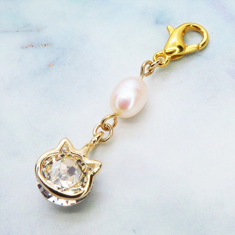 マスクチャーム ゴールド猫フレームのスワロフスキー(5色選択)と淡水パールの大人可愛いチャーム