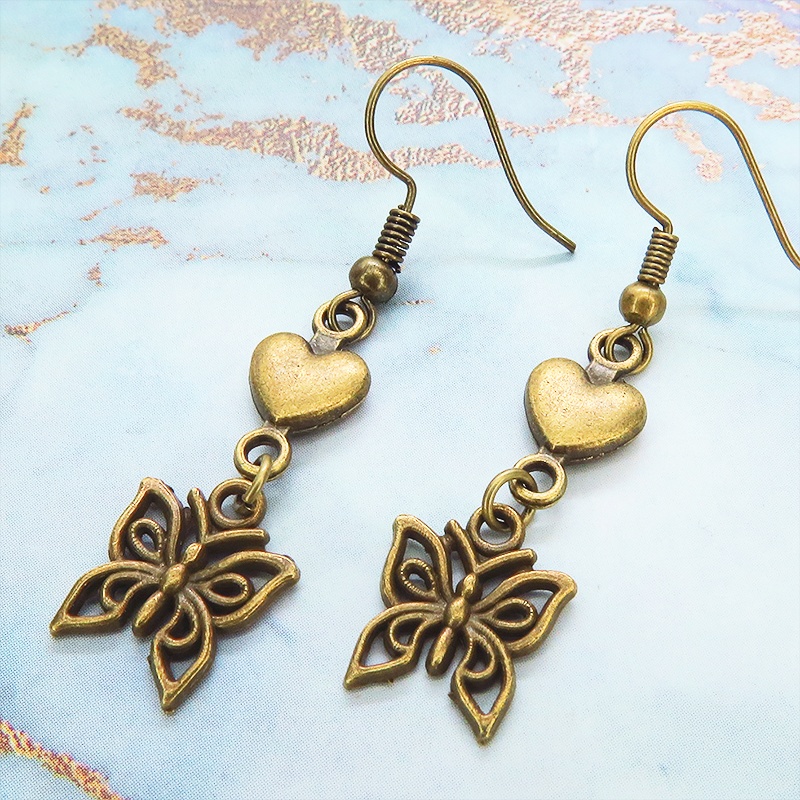 アンティークゴールド 蝶とハートを組合せたピアス シンプル コンパクト バタフライピアス