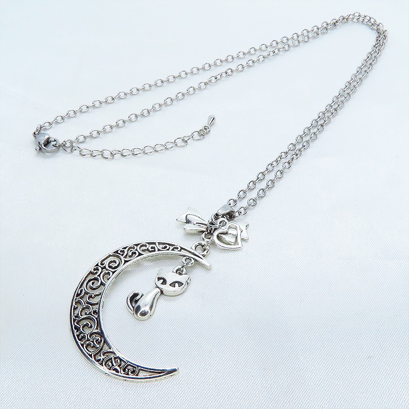 アンティークシルバーの猫と透かし三日月の大人可愛いネックレス ムーンネックレス リボン ハート 銀古美