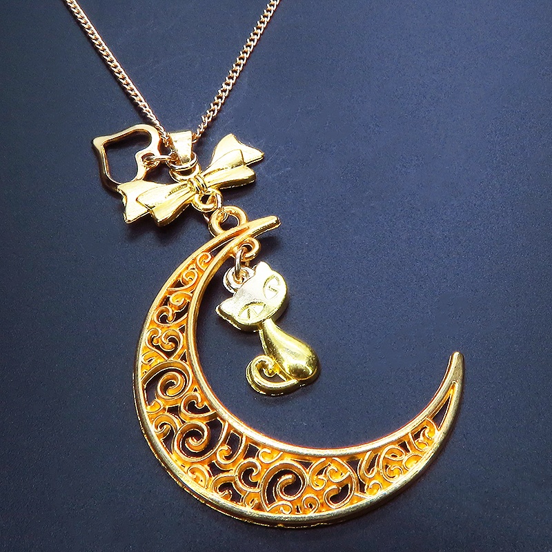 ゴールドカラーの猫と透かし三日月の大人可愛いネックレス ムーンネックレス リボン ハート