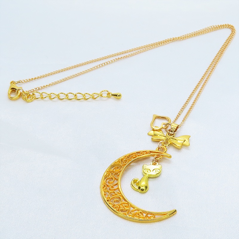 ゴールドカラーの猫と透かし三日月の大人可愛いネックレス ムーンネックレス リボン ハート