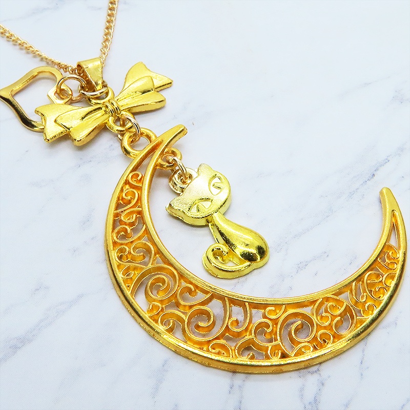 ゴールドカラーの猫と透かし三日月の大人可愛いネックレス ムーンネックレス リボン ハート