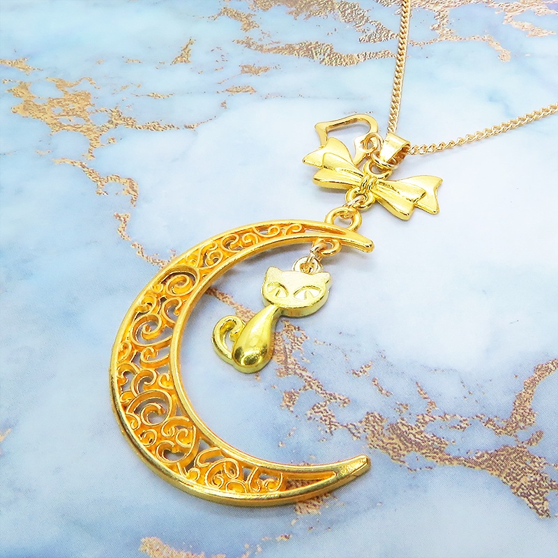 ゴールドカラーの猫と透かし三日月の大人可愛いネックレス ムーンネックレス リボン ハート