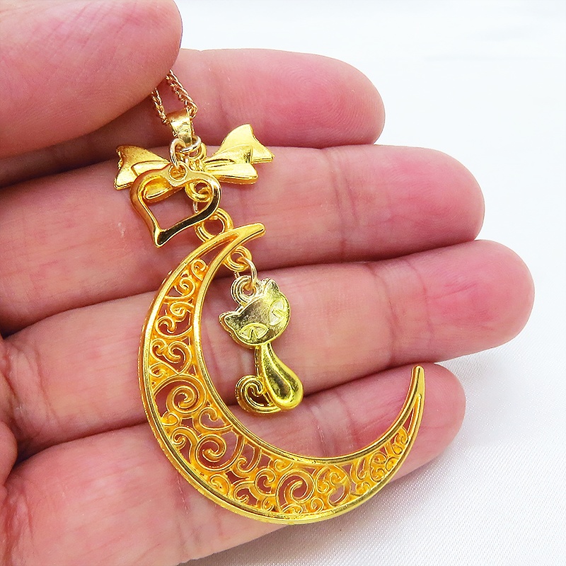 ゴールドカラーの猫と透かし三日月の大人可愛いネックレス ムーンネックレス リボン ハート