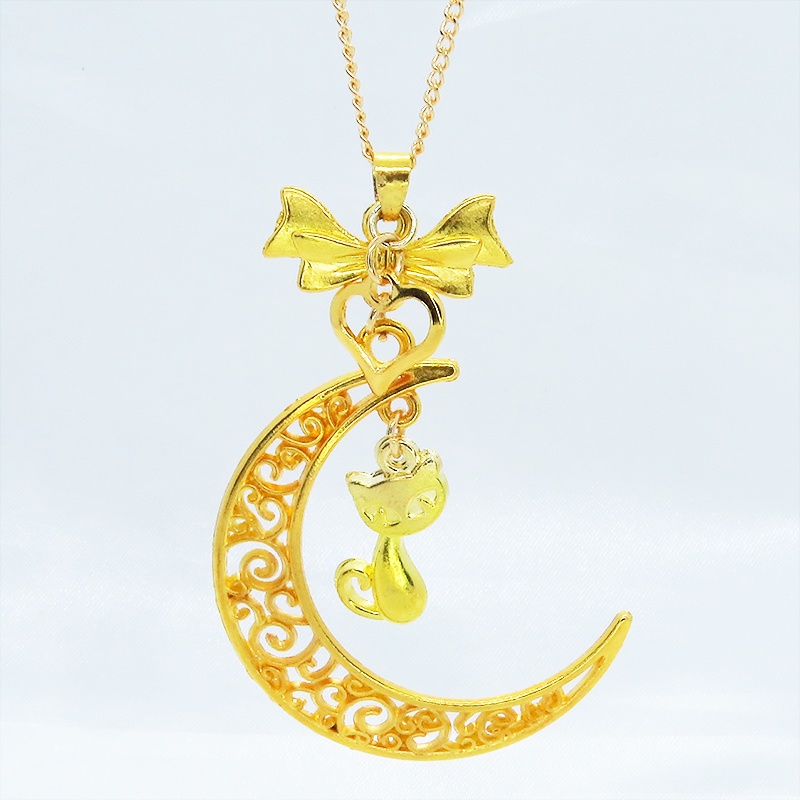 ゴールドカラーの猫と透かし三日月の大人可愛いネックレス ムーンネックレス リボン ハート
