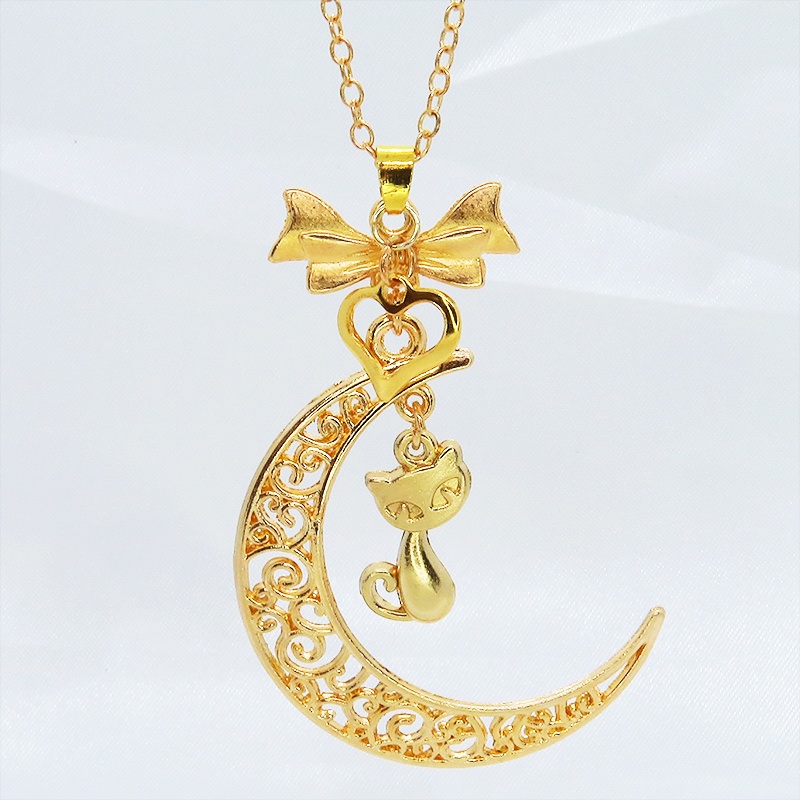 マットゴールドの猫と透かし三日月の大人可愛いネックレス ムーンネックレス リボン ハート