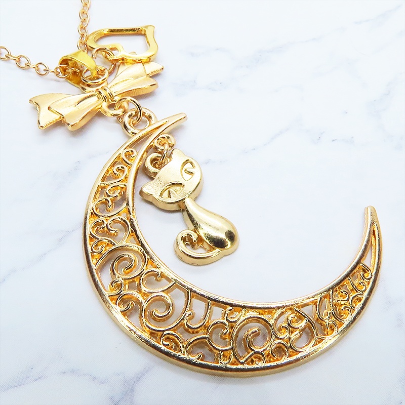マットゴールドの猫と透かし三日月の大人可愛いネックレス ムーンネックレス リボン ハート