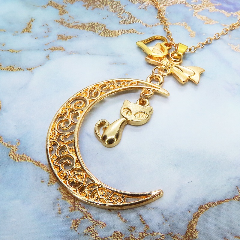 マットゴールドの猫と透かし三日月の大人可愛いネックレス ムーンネックレス リボン ハート