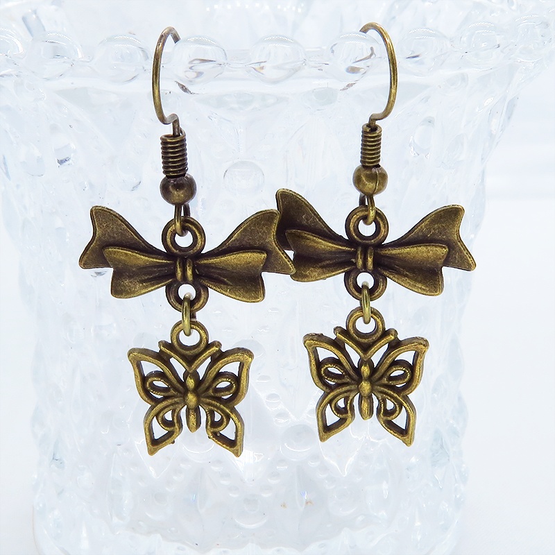 アンティークゴールド 蝶とリボンのピアス バタフライ 蝶々 シンプル コンパクト シンメトリー