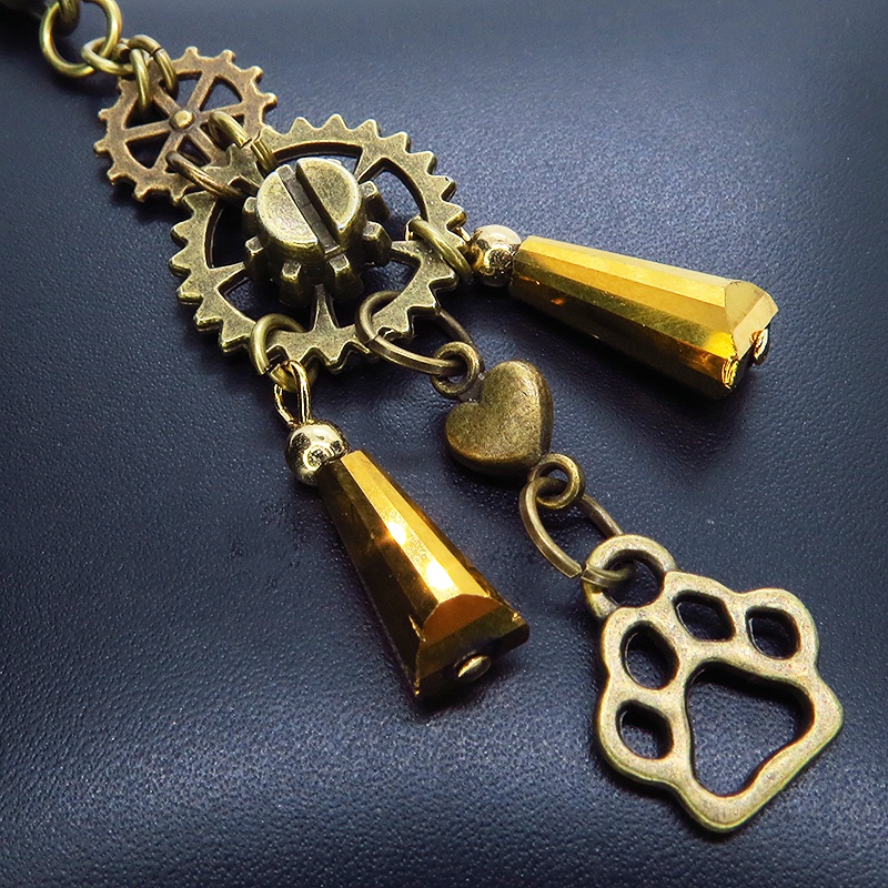 スチームパンク風アンティークカラーの歯車と肉球のメタルタッセルキーホルダー 猫 犬 バッグチャーム
