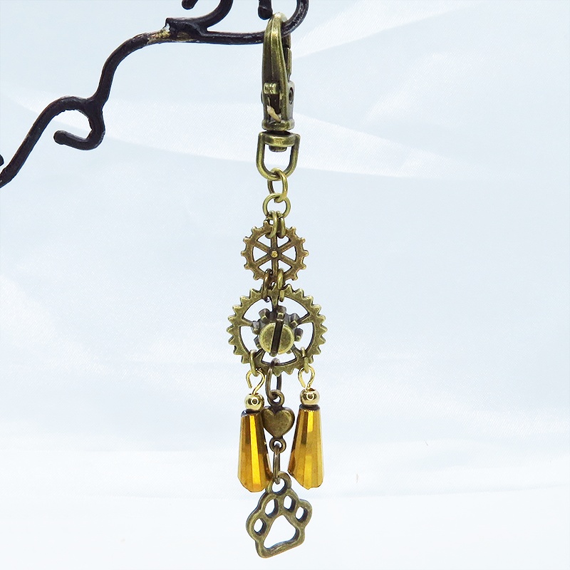 スチームパンク風アンティークカラーの歯車と肉球のメタルタッセルキーホルダー 猫 犬 バッグチャーム