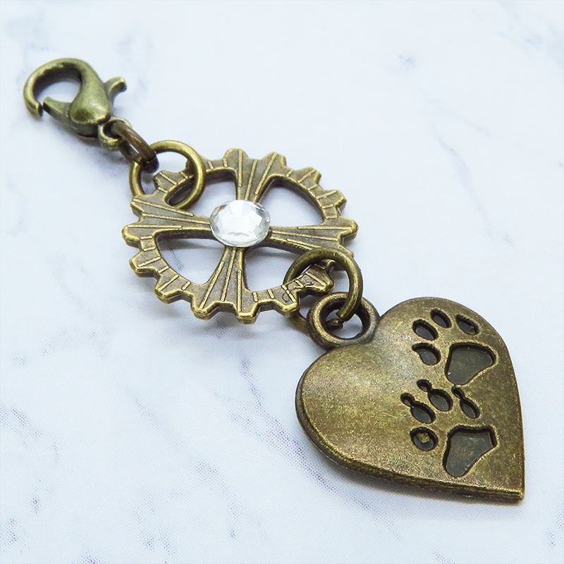 マスクチャーム 肉球の刻印入りのハートと歯車をつなげた可愛いチャーム キーホルダー バッグチャーム 猫 犬