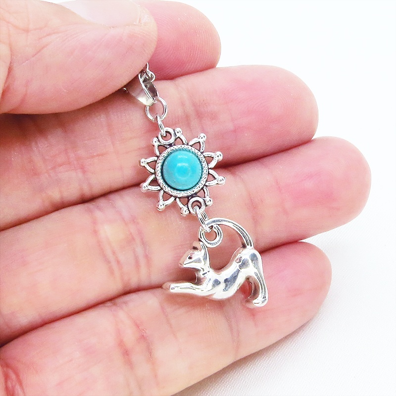 シルバーカラー のび猫とひまわりモチーフをつなげたネックレス ターコイズ 長さ変更可 SV925変更可