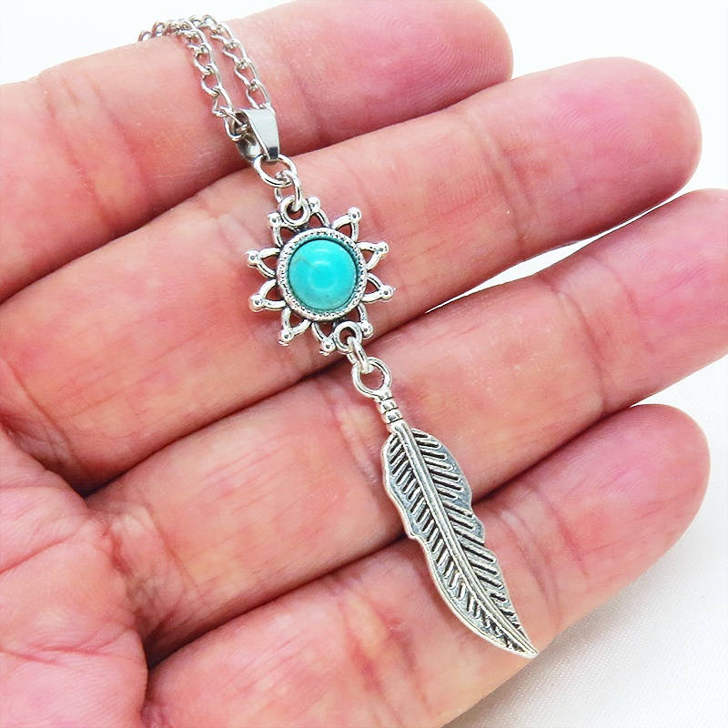 シルバーカラー フェザーとひまわりのモチーフを繋げたネックレス ターコイズ 長さ変更可 SV925変更可