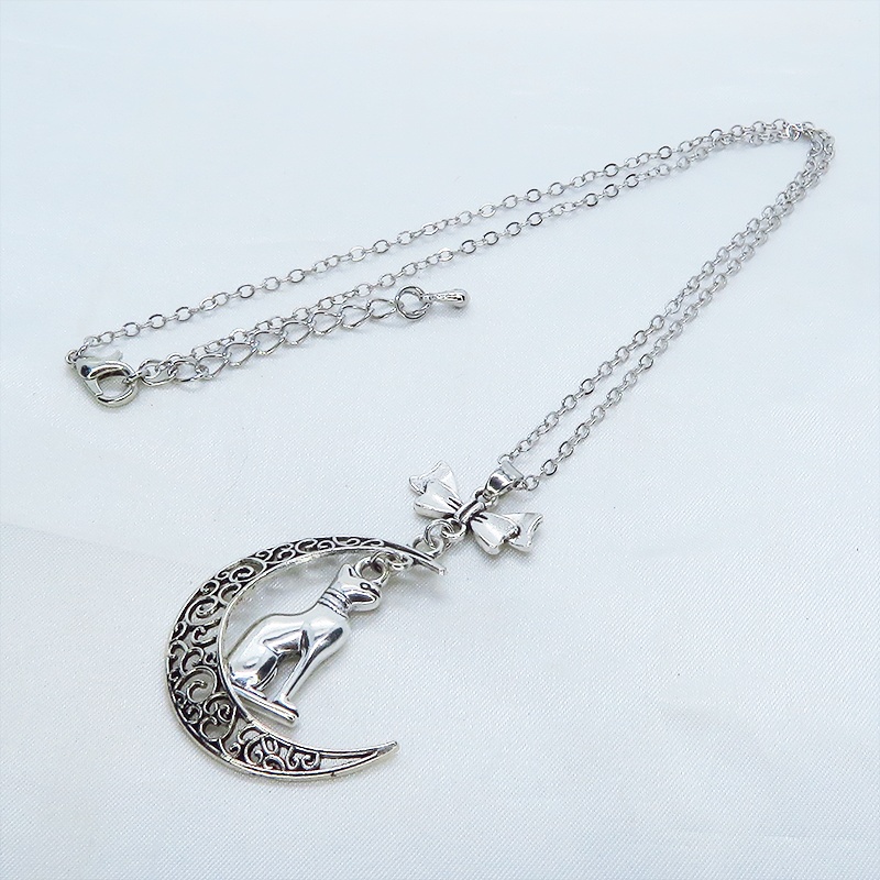 猫の神様 アンティークシルバーのバステト神と透かし三日月の大人可愛いネックレス ムーン リボン アジャスター付