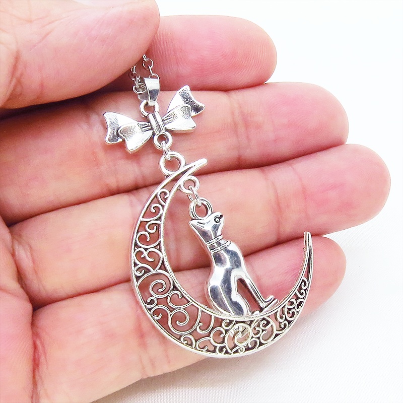 猫の神様 アンティークシルバーのバステト神と透かし三日月の大人可愛いネックレス ムーン リボン アジャスター付