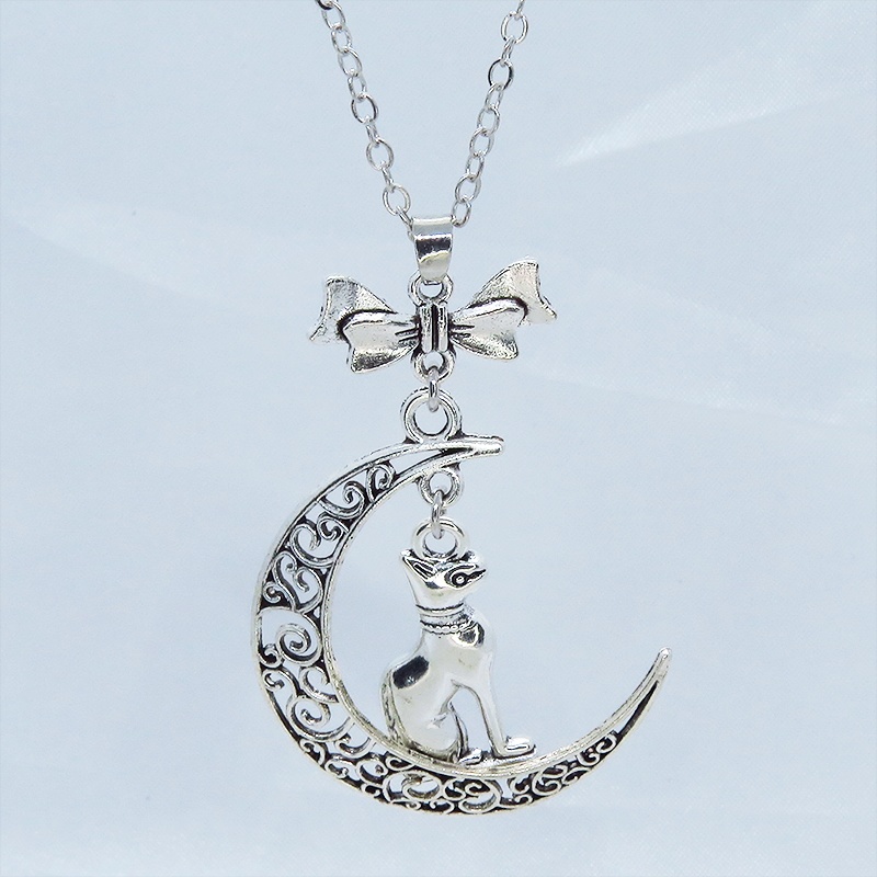 猫の神様 アンティークシルバーのバステト神と透かし三日月の大人可愛いネックレス ムーン リボン アジャスター付