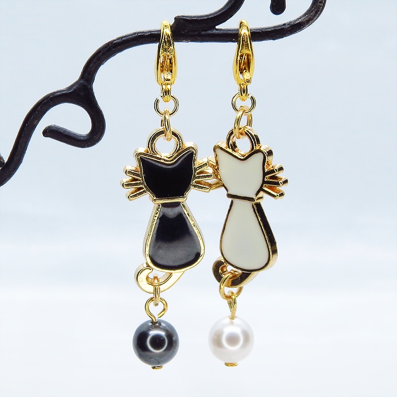 マスクチャーム 白猫 黒猫 エナメルモチーフとスワロフスキーパールをつなげたチャーム キーホルダー