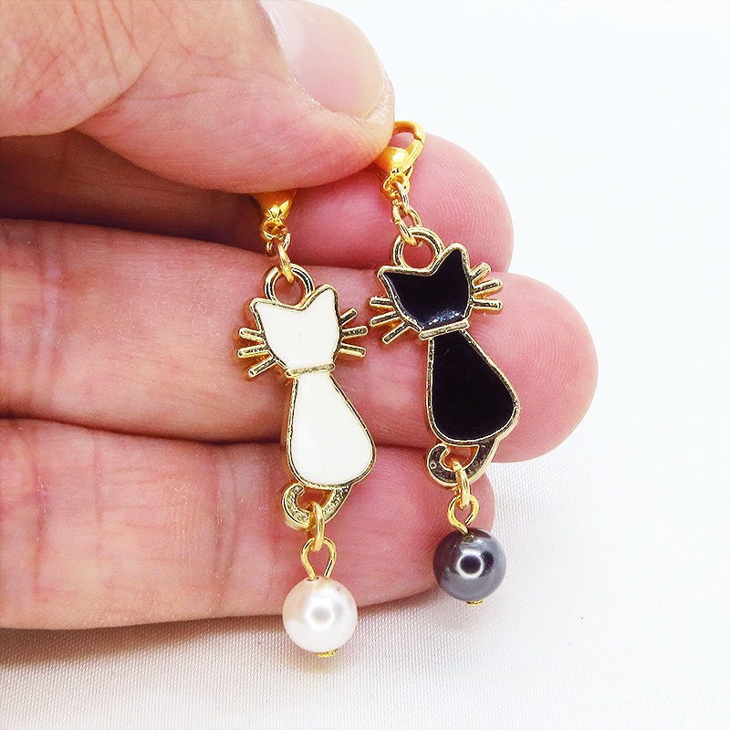マスクチャーム 白猫 黒猫 エナメルモチーフとスワロフスキーパールをつなげたチャーム キーホルダー