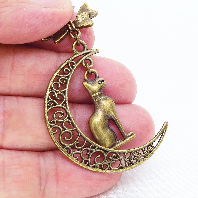 猫の神様 アンティークゴールドのバステト神と透かし三日月の大人可愛いネックレス ムーン リボン アジャスター付