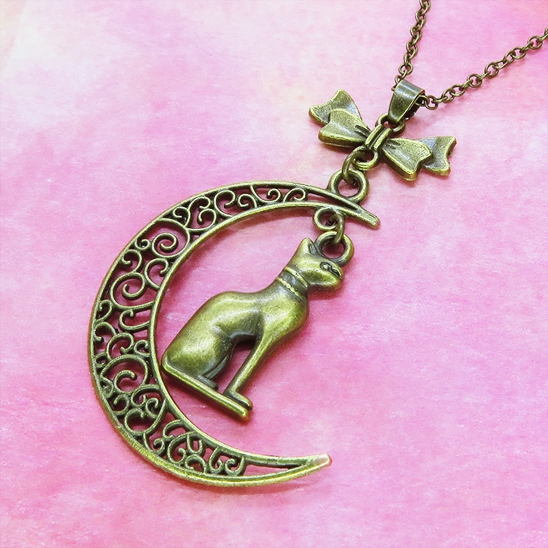 猫の神様 アンティークゴールドのバステト神と透かし三日月の大人可愛いネックレス ムーン リボン アジャスター付