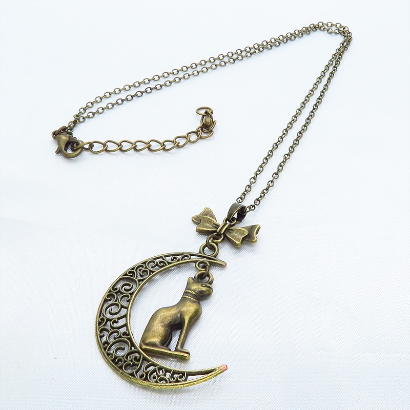 猫の神様 アンティークゴールドのバステト神と透かし三日月の大人可愛いネックレス ムーン リボン アジャスター付