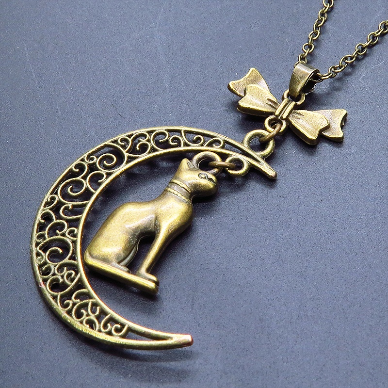 猫の神様 アンティークゴールドのバステト神と透かし三日月の大人可愛いネックレス ムーン リボン アジャスター付
