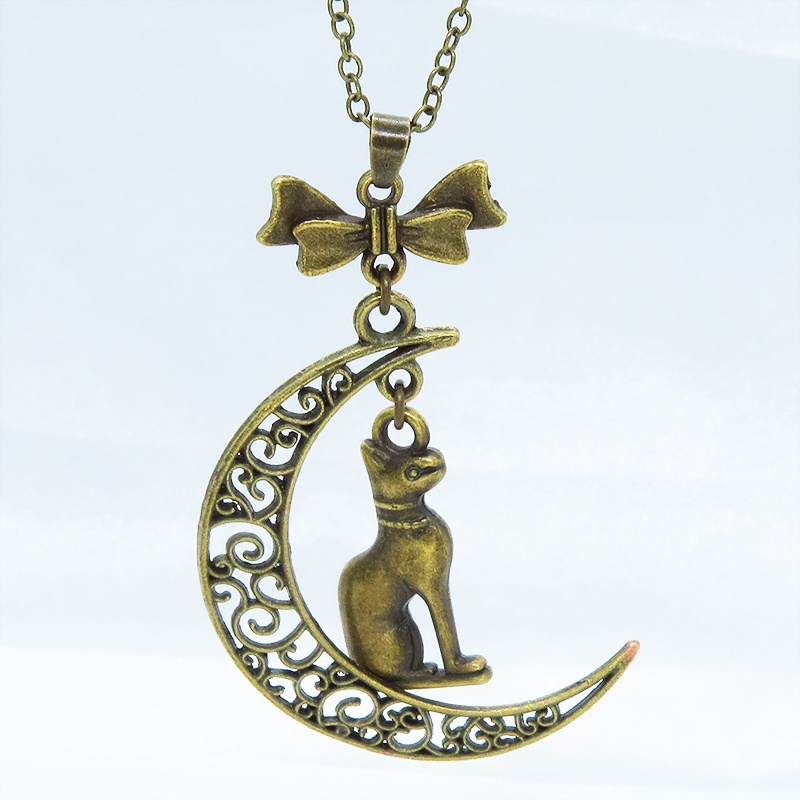 猫の神様 アンティークゴールドのバステト神と透かし三日月の大人可愛いネックレス ムーン リボン アジャスター付