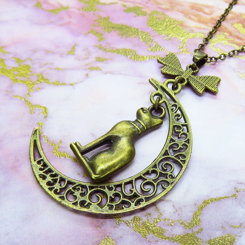 猫の神様 アンティークゴールドのバステト神と透かし三日月の大人可愛いネックレス ムーン リボン アジャスター付